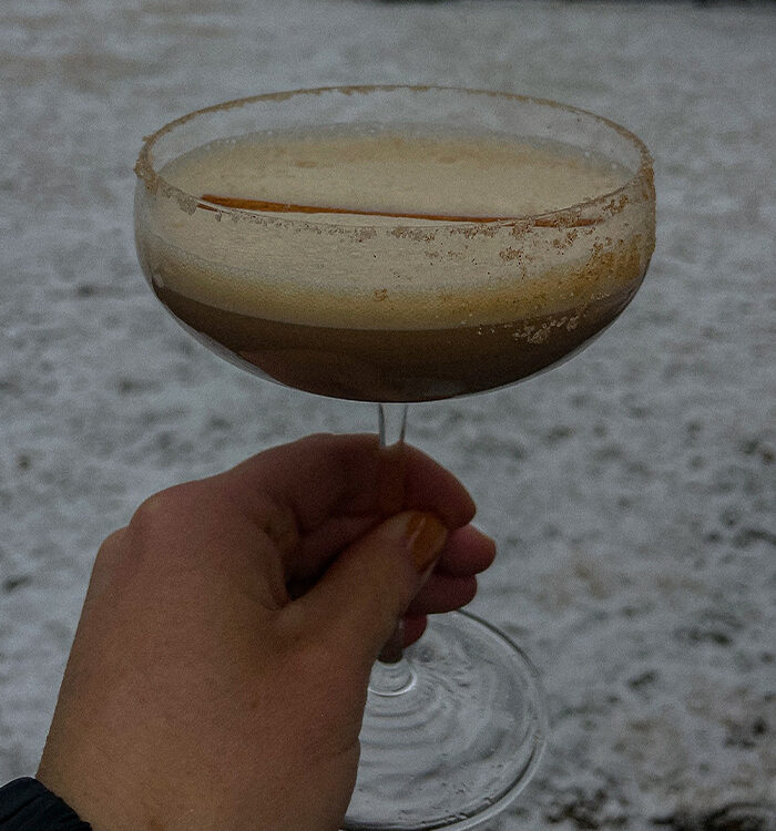 Creamy Dirty Chai Martini topped with a cinnamon stick