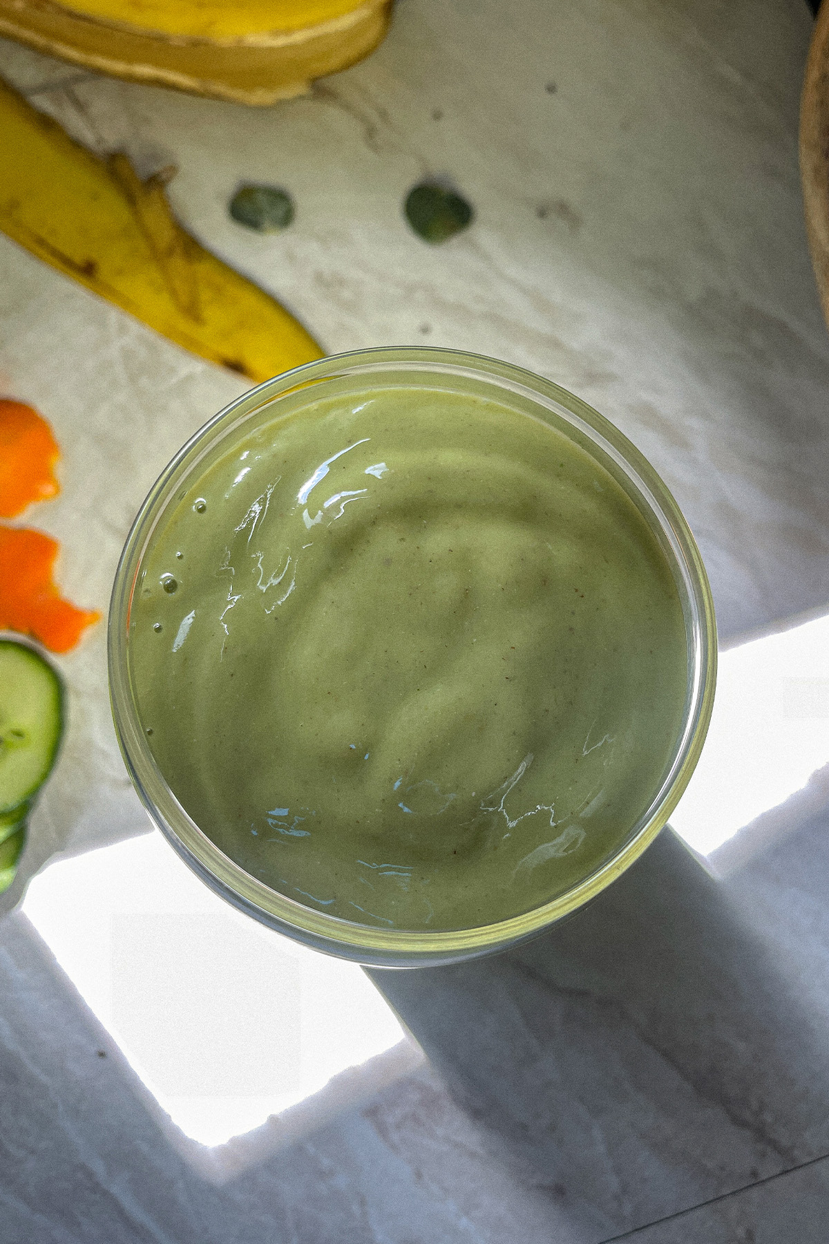 Refreshing tropical green smoothie in a glass