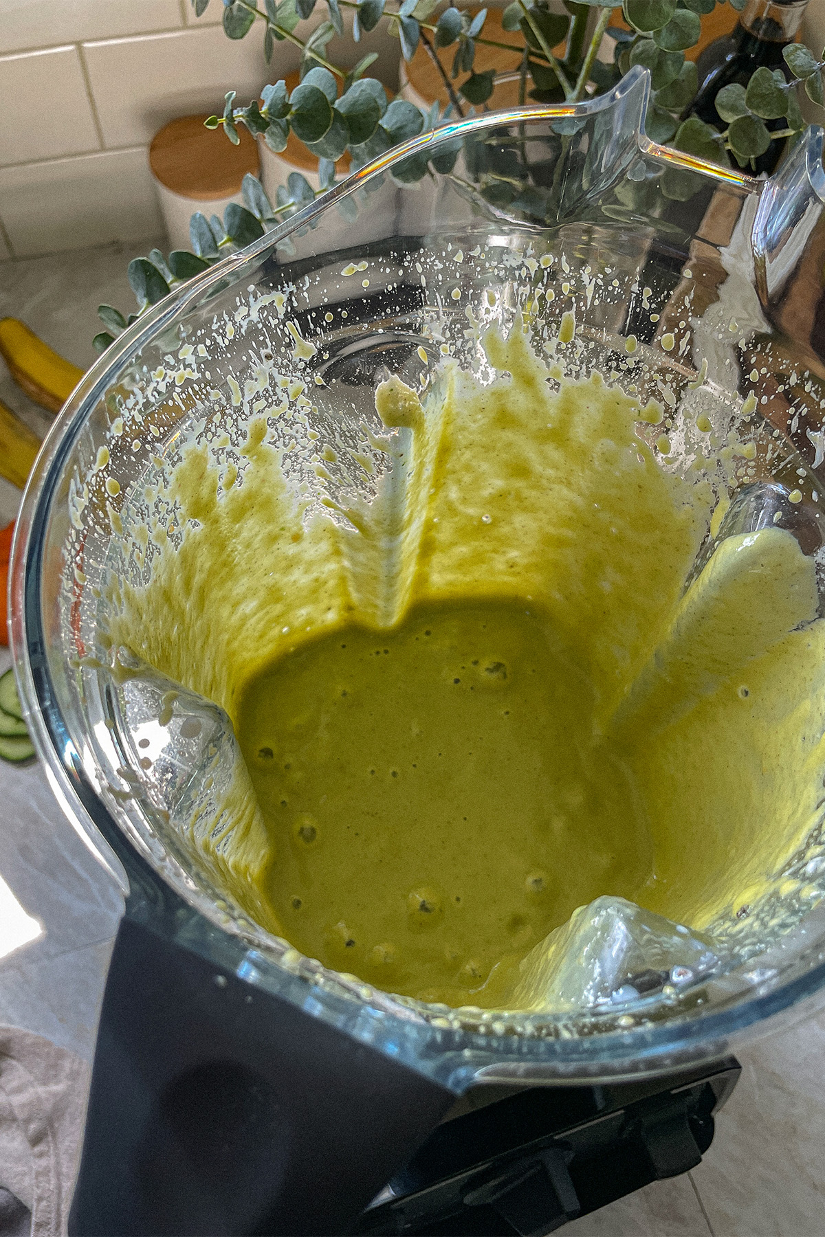 Tropical green smoothie in the blender