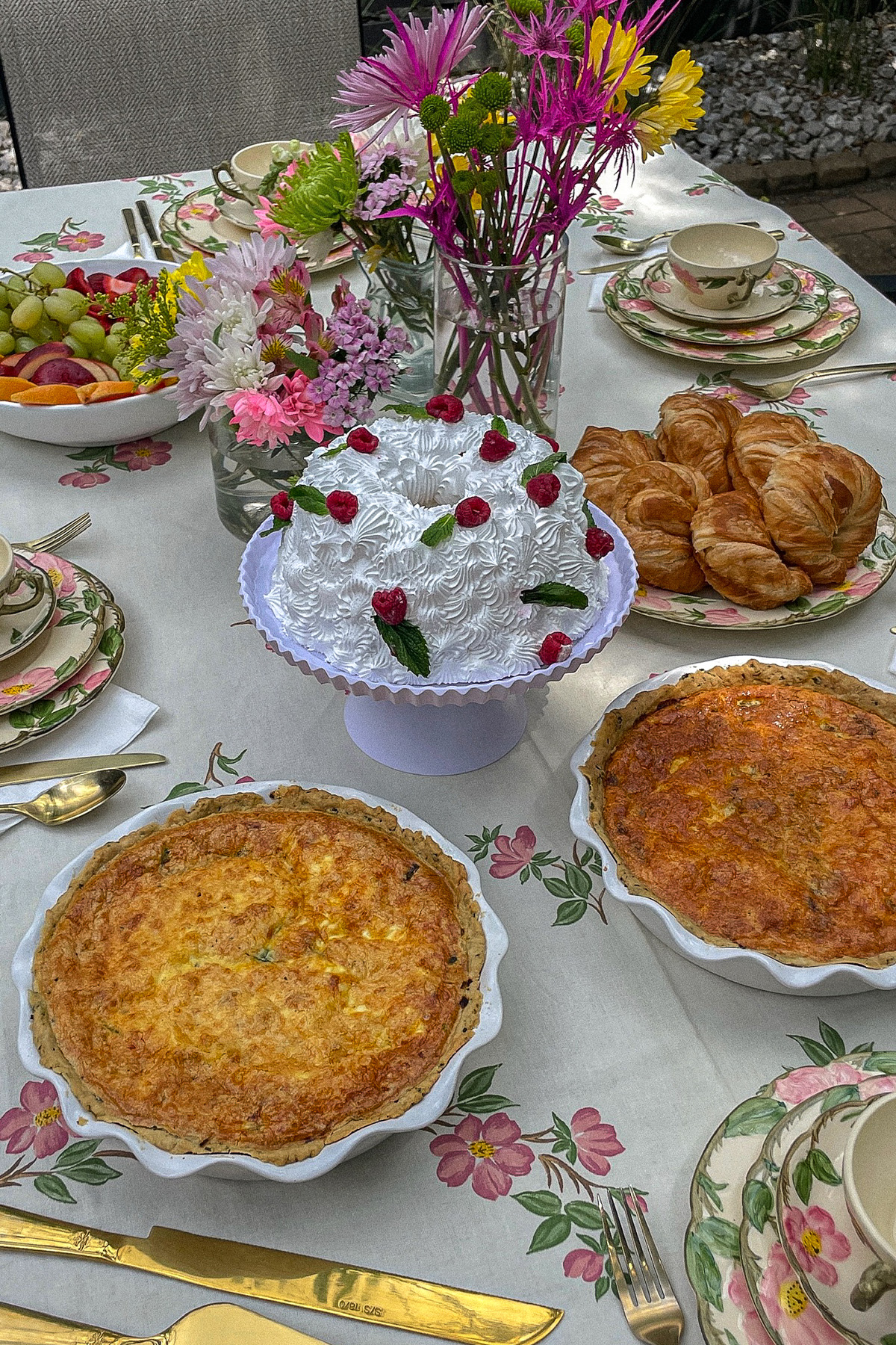 Italian Sausage Red Pepper Quiche on a garden party brunch table