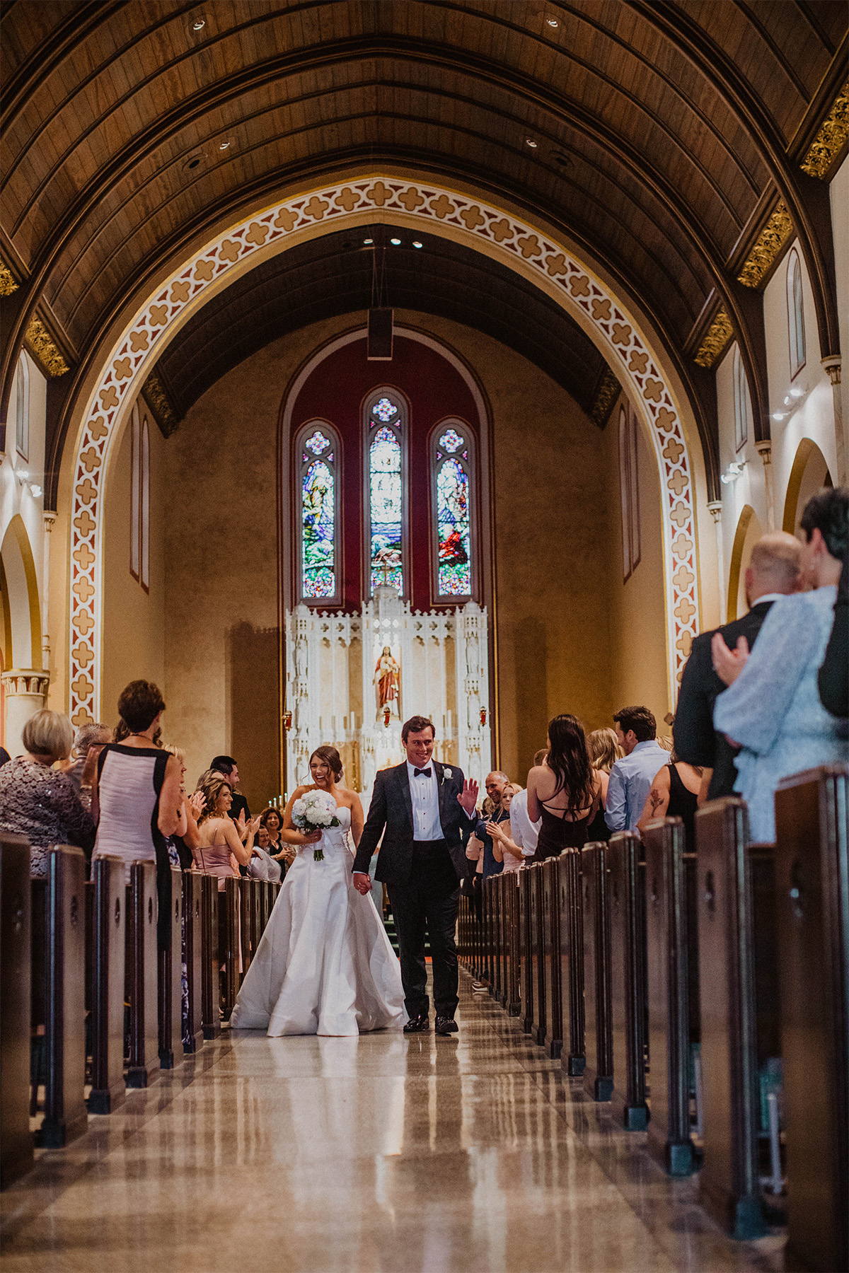 Bride and groom exiting the church after the ceremony