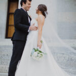 Bride and groom posing in downtown Columbus, Ohio