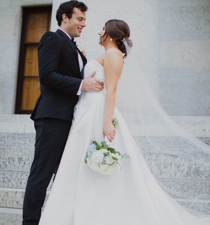 Bride and groom posing in downtown Columbus, Ohio