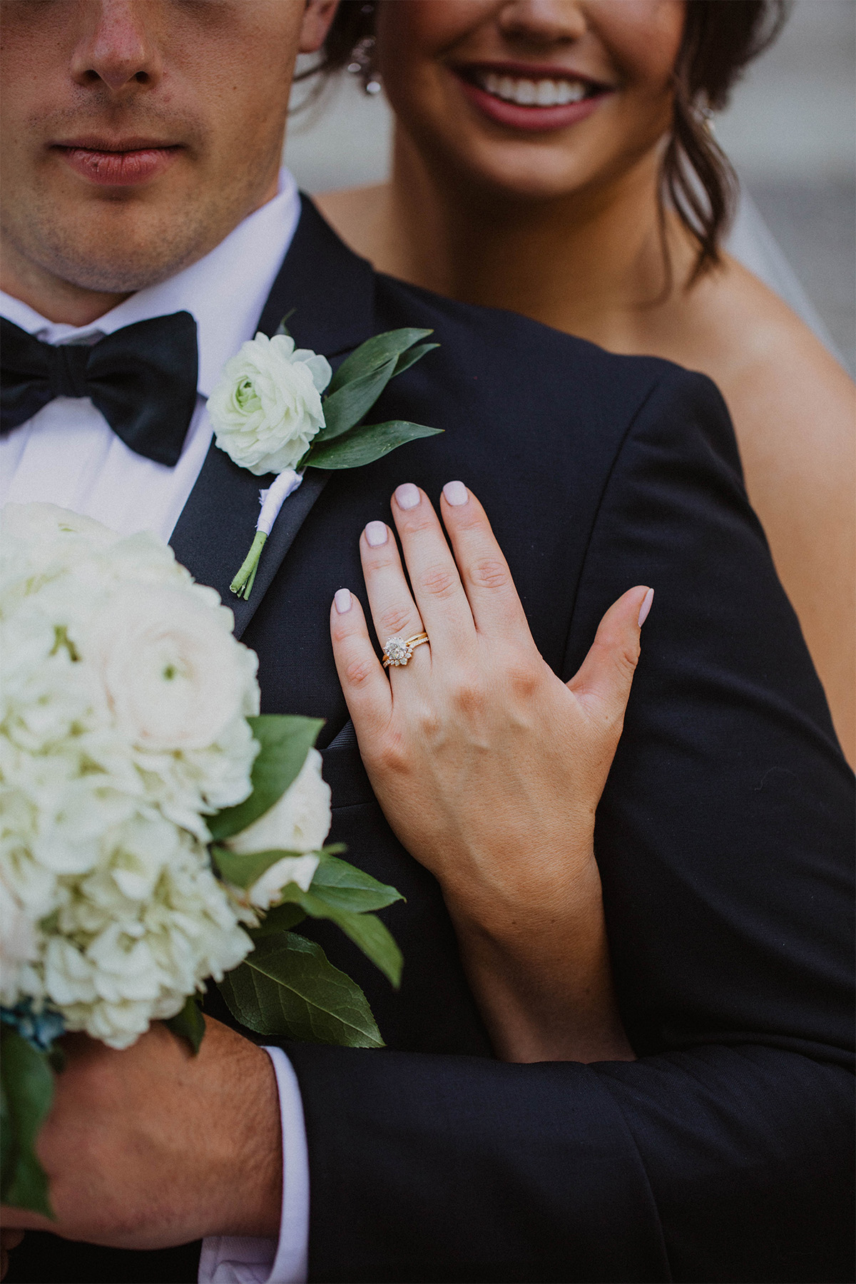 Close-up of bride and groom's wedding rings