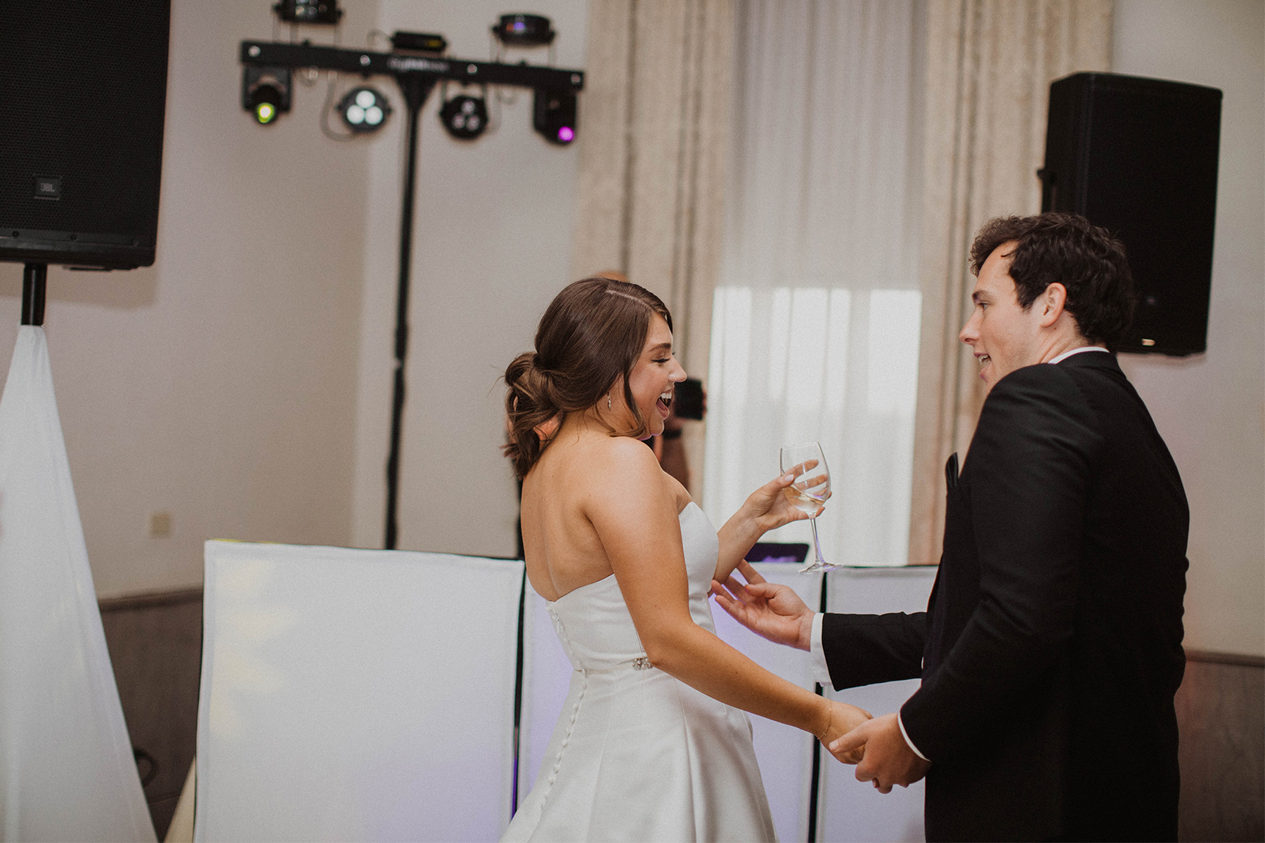 Bride and groom dancing at the wedding reception