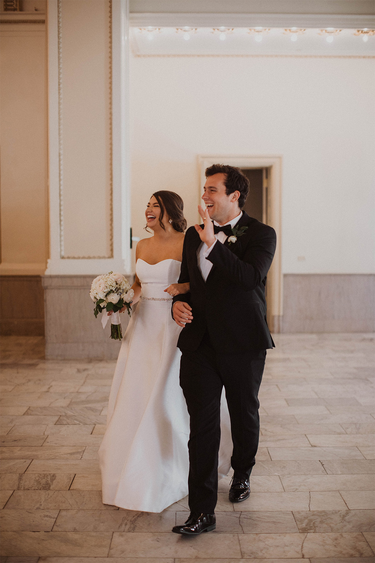 Bride and groom entering the reception at the Westin Great Southern Columbus