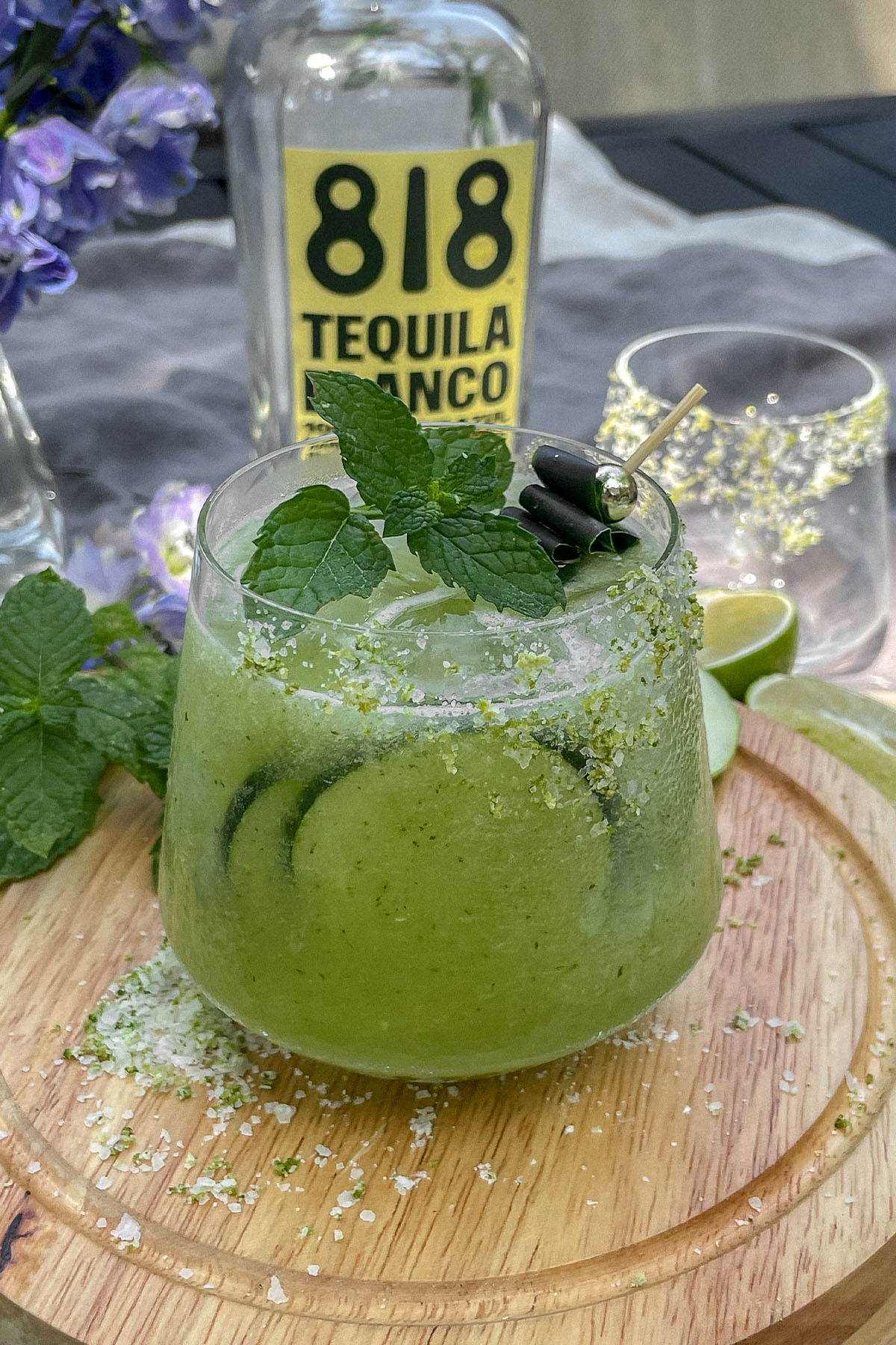 Cucumber Mint Margarita and 818 Tequila bottle