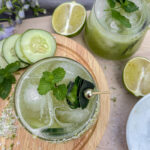 Cucumber Mint Margaritas served in rocks glasses with fresh mint and cucumber garnish