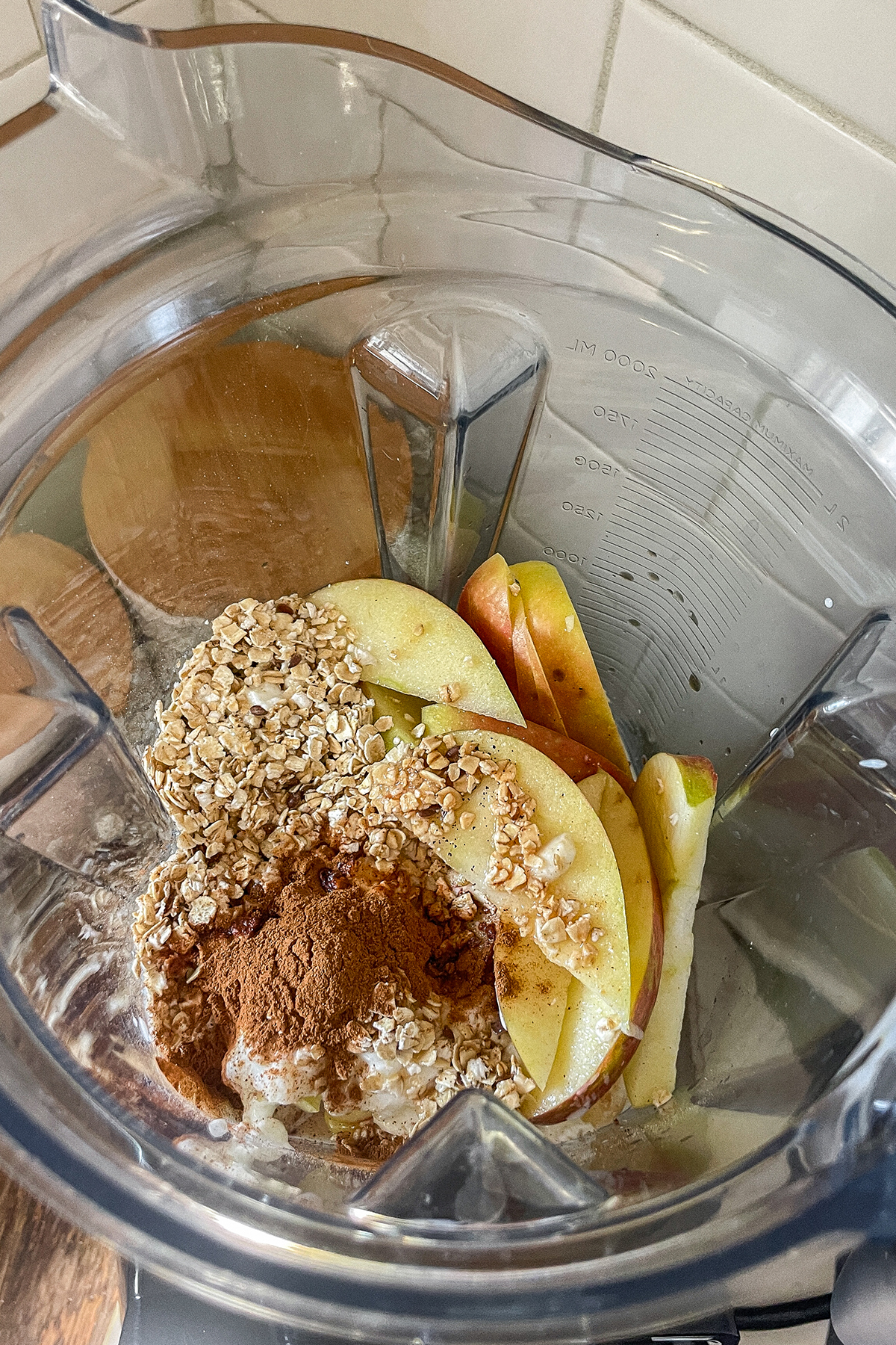 Maple Apple Crisp Smoothie ingredients in a blender