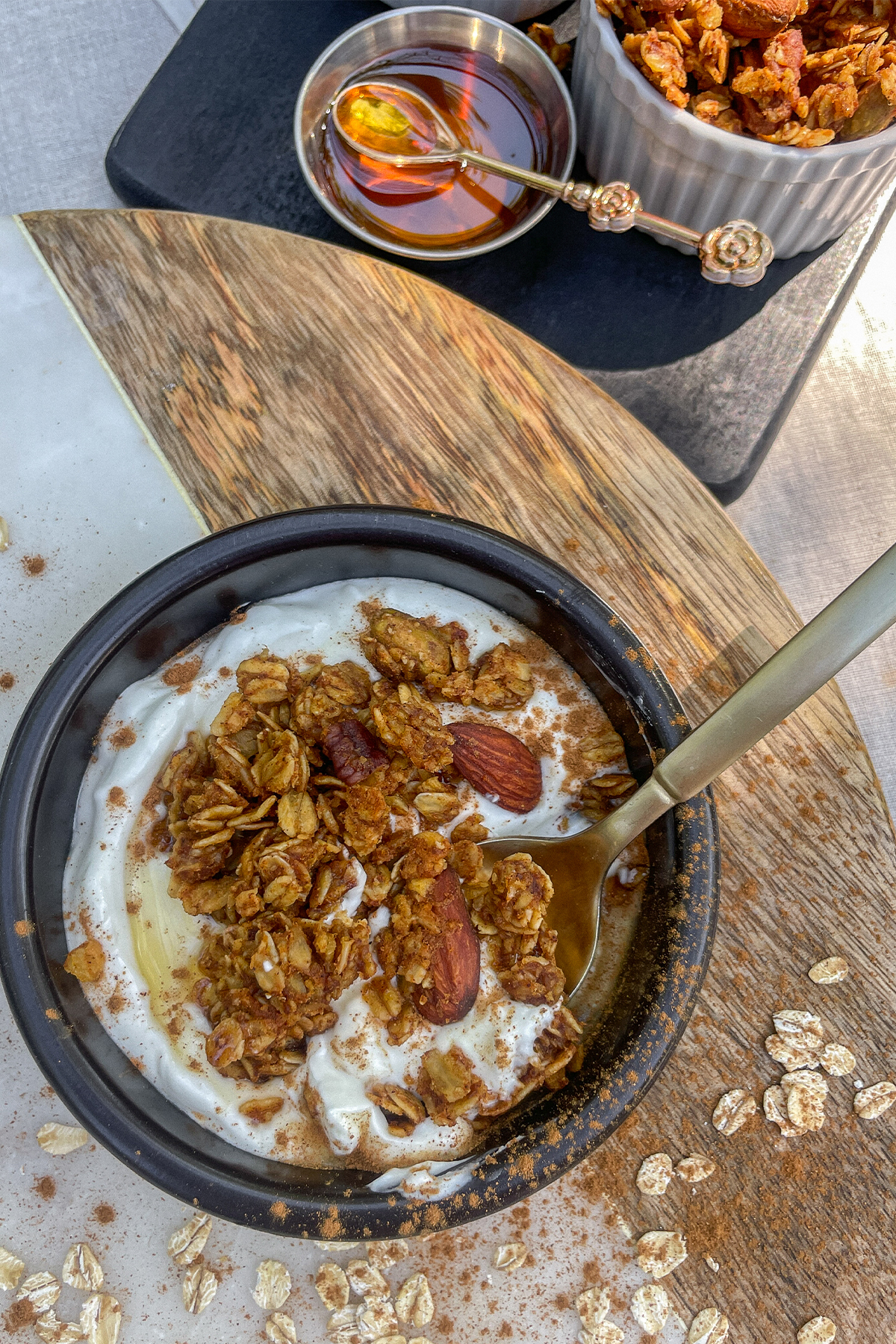 Yogurt parfait topped with maple syrup, cinnamon and Fall Pumpkin Spice Granola