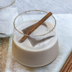 Iced Bourbon Chai cocktail garnished with a cinnamon stick