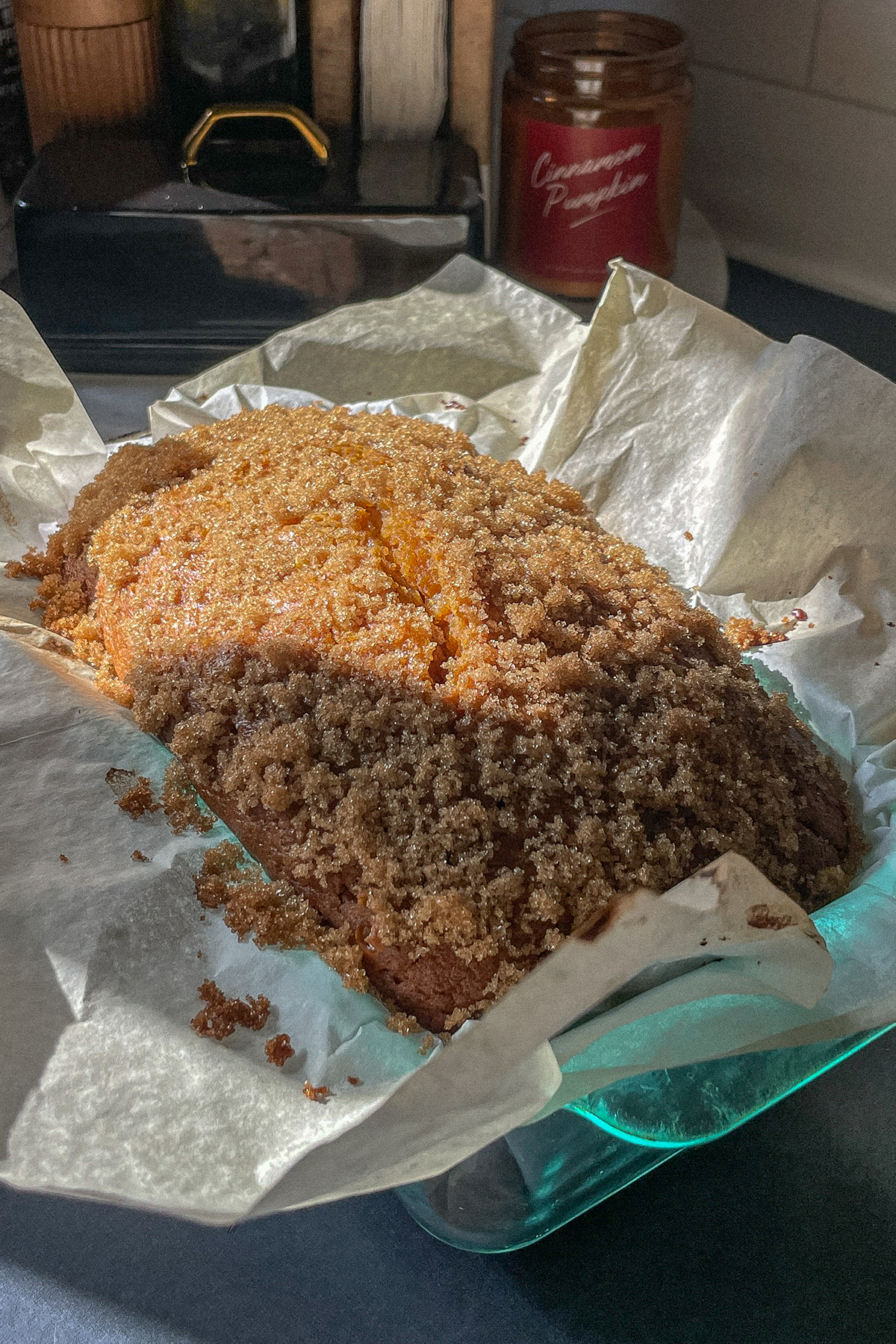 Pumpkin Spice Bourbon Bread in a glass loaf pan