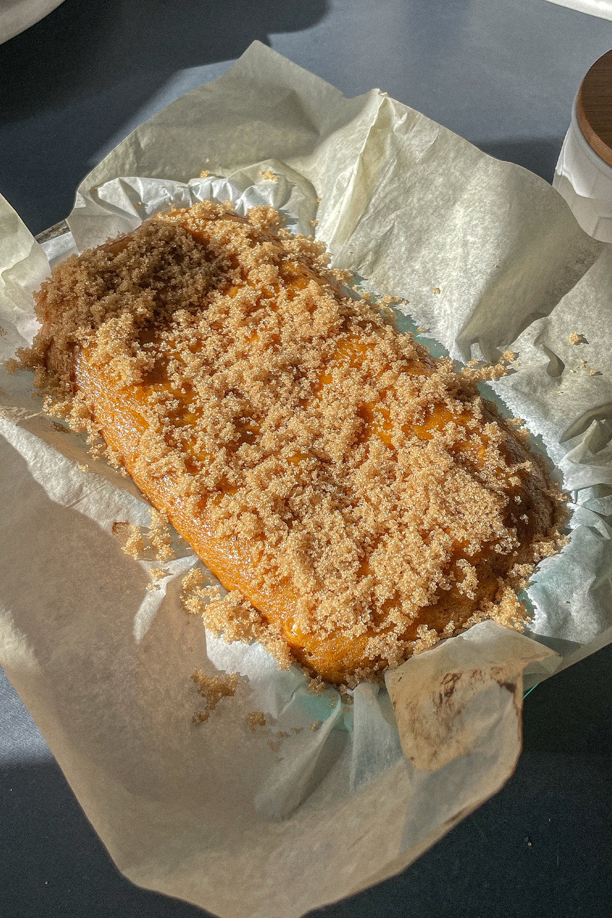 Partially baked Pumpkin Spice Bourbon Bread with brown sugar topping added