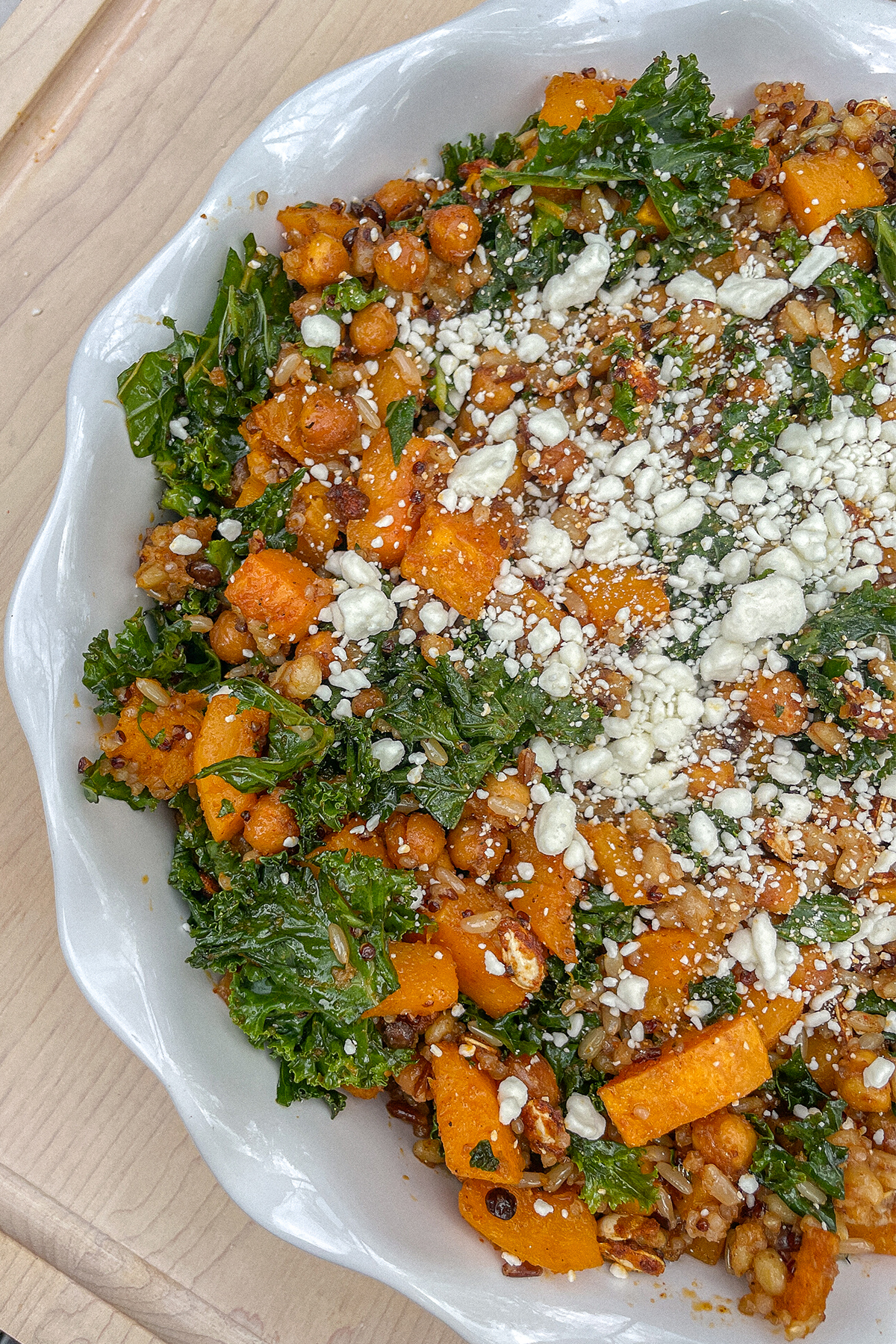 Roasted Butternut Squash Quinoa Salad in a ruffle pie dish