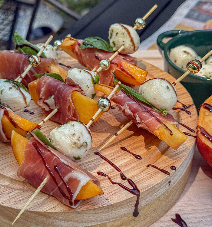 Prosciutto Peach Mozzarella Bites on a platter