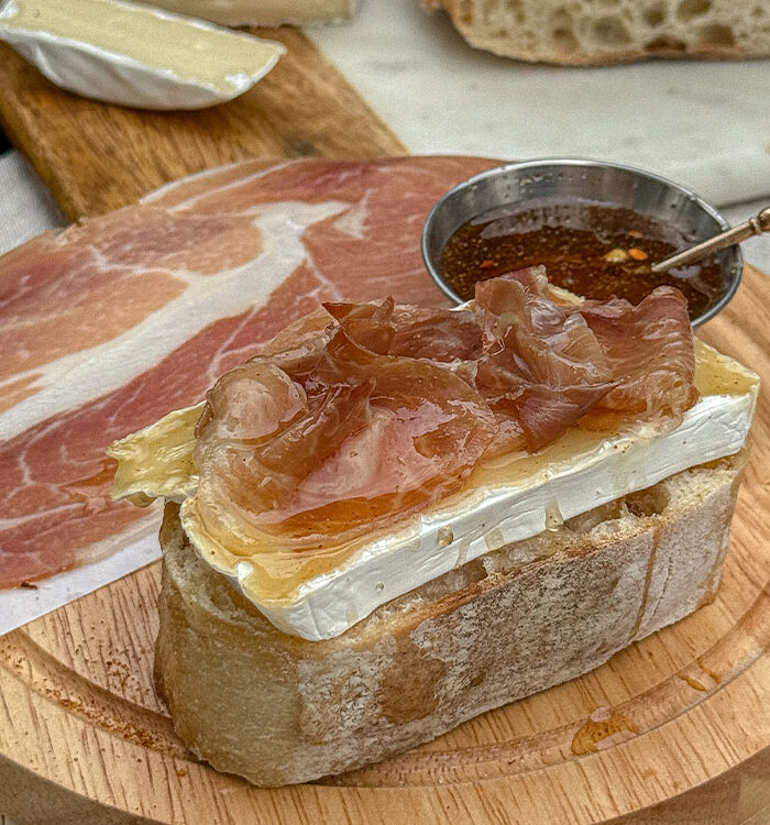 Slice of Prosciutto & Brie Toast With Hot Honey